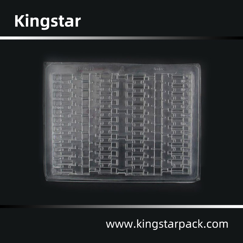 Thermoformed clamshell blister packaging for electronic parts